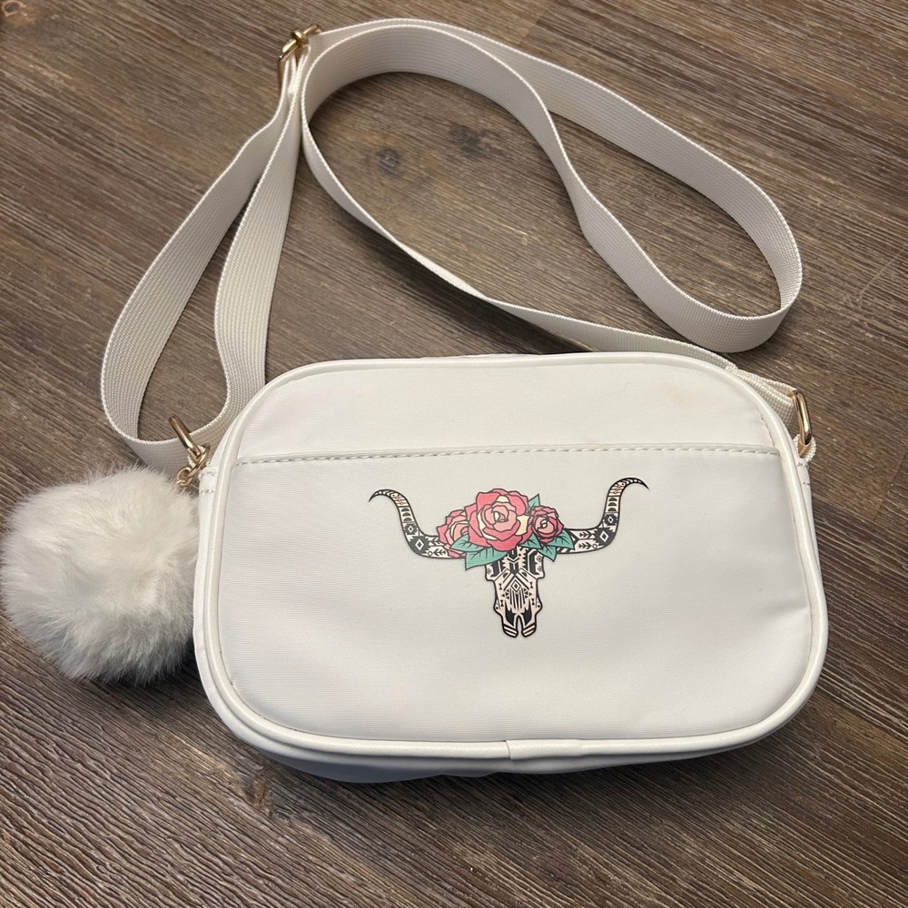 Like Dreams White Crossbody Bag with Bull Skull Floral‎ Design and Pom Pom